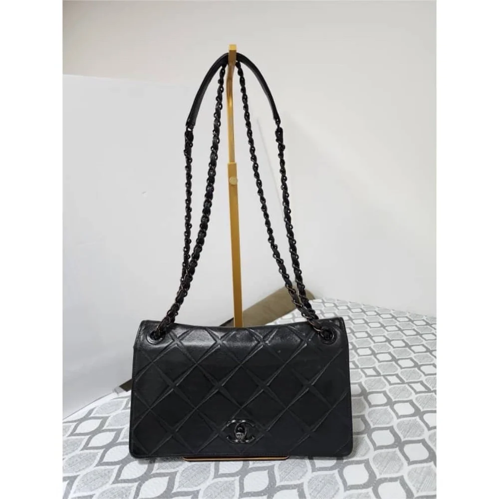 Authentic CHANEL Quilted Lambskin Leather Orient Express Flap Bag Black